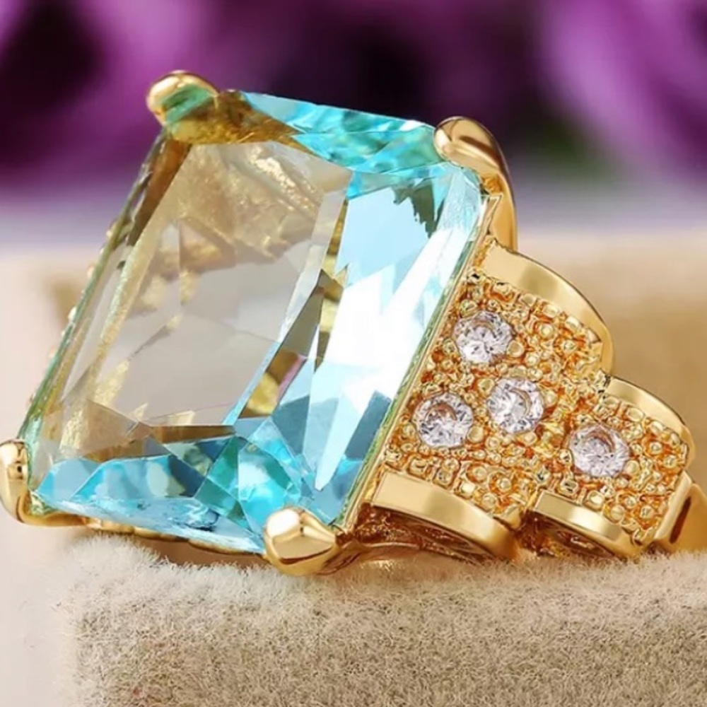 Light Blue Zircon/Tiny Diamond in an intricate Gold Setting NWOT